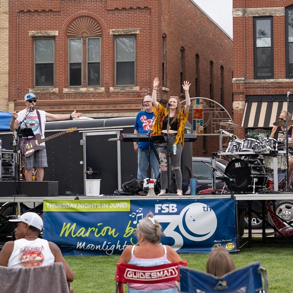 Crazy Delicious performs on stage during night one of Marion by Moonlight, celebrating FSB’s 30th year of the event.