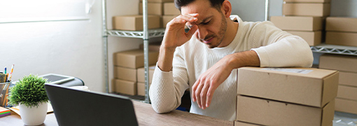 Frustrated small business owner after falling victim to Business Email Compromise fraud