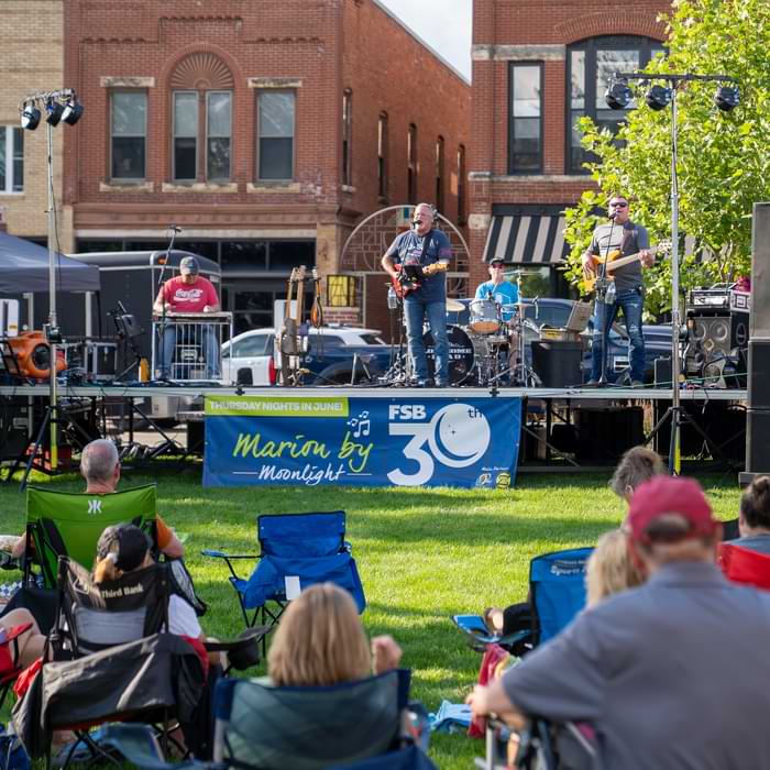 Crowd watches Lonesome Road perform during night four of Marion by Moonlight in downtown Marion.